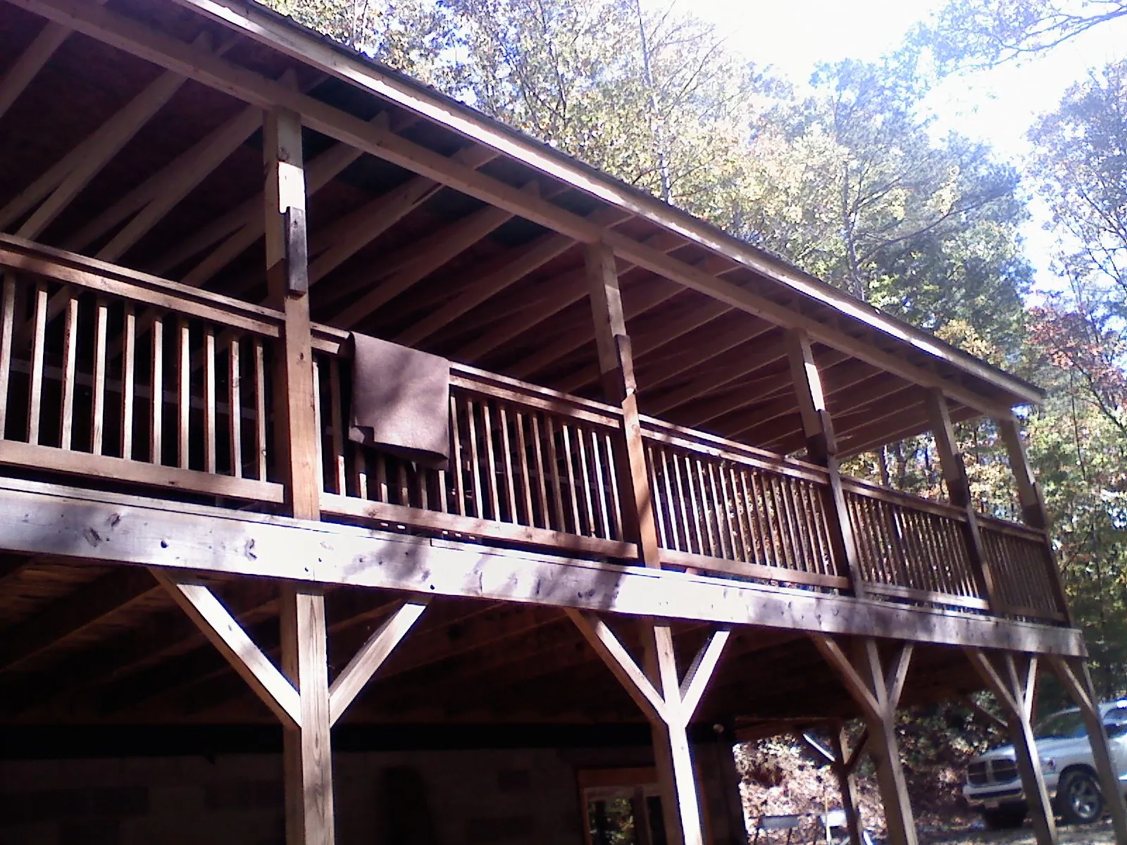 Timber framing under a new elevated porch and deck — Roof Leak Repair in Coalfield by Roofing Brothers